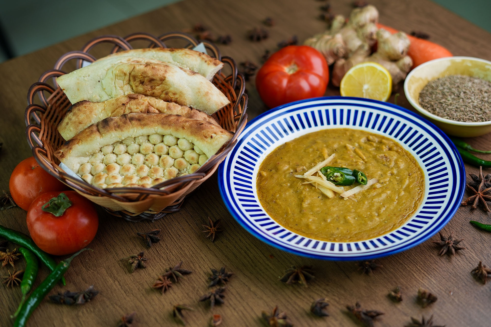 Pakistani daal with fresh naan, tomatoes and spices